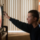 Millie Brown as Eleven watches TV. (Photo: Netflix)